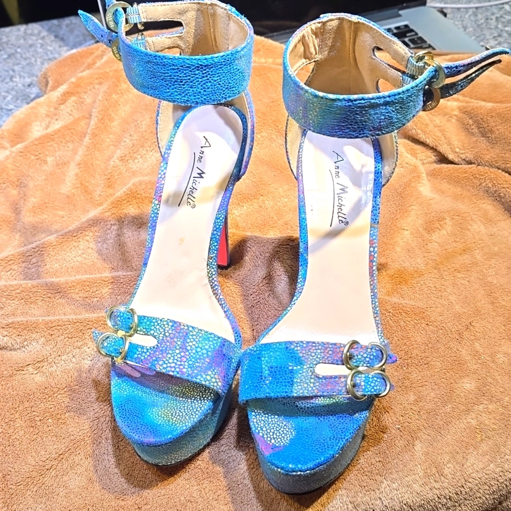 Blue Platform Heels with pink soles.